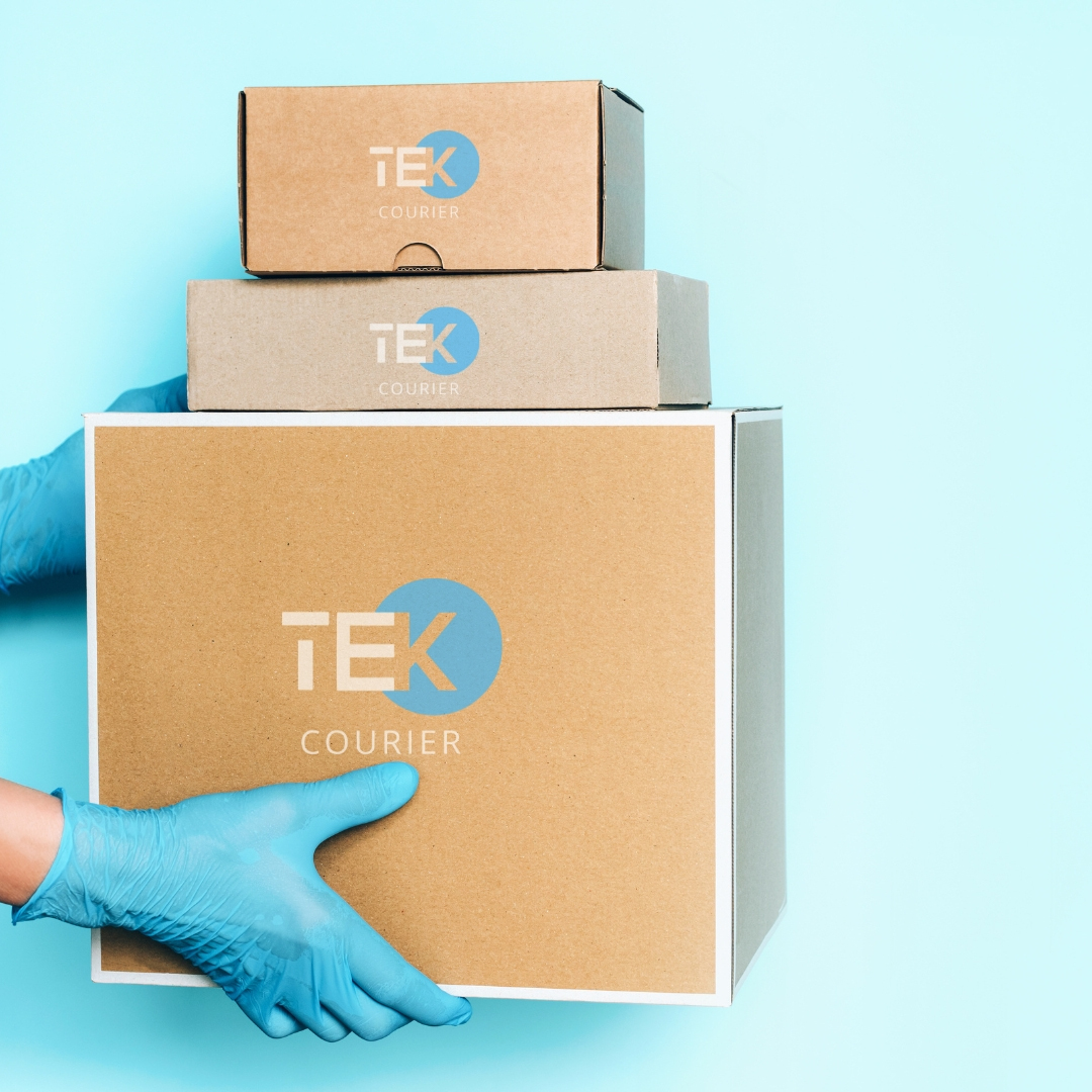 Individual holding cardboard boxes